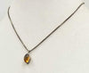 Pretty! Sterling silver chain with a Baltic amber pendant necklace. 16" Length. Vegan.
