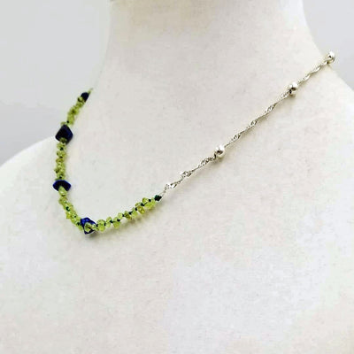 Unisex, adjustable, sterling silver, peridot & lapis lazuli necklace strung with verde silk. 20