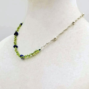 Unisex, adjustable, sterling silver, peridot & lapis lazuli necklace strung with verde silk. 20" length.