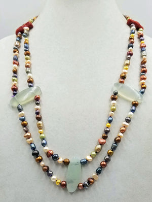 Sterling silver, multi-color freshwater & cultured pearl with coral & prehnite, hand-knotted with purple silk. 27" length.