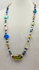Pretty colors! Art glass, pearls, garnet, & sodalite, rope necklace on hand-knotted canary yellow silk.