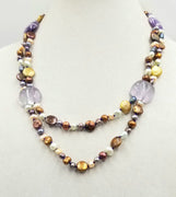 Sterling silver, multi-color pearls & bi-tone amethyst, two strand necklace, hand-knotted purple silk.