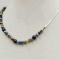 Sterling silver, multi-color fresh-water pearl necklace, hand-knotted with dove grey silk. Unisex style. 17.5" length.