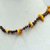 Adjustable, bi-tone Baltic amber, sterling silver, men's unisex necklace knotted with crimson silk. 15.5 - 17".