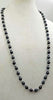 PRICEREDUCED "Quiet elegance." Alternating cultured & fresh-water pearls, hand-knotted with sky blue silk, rope necklace. 33" length.