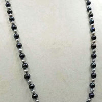 "Quiet elegance." Alternating cultured & fresh-water pearls, hand-knotted with sky blue silk, rope necklace. 33" length.