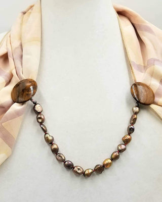 Unique. Bronze pearls, myrtle wood, cape clasp on crimson silk.
