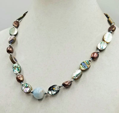 Sterling silver, abalone, bronze baroque pearls, with aquamarine focal necklace on hand-knotted sky blue silk. 21.25