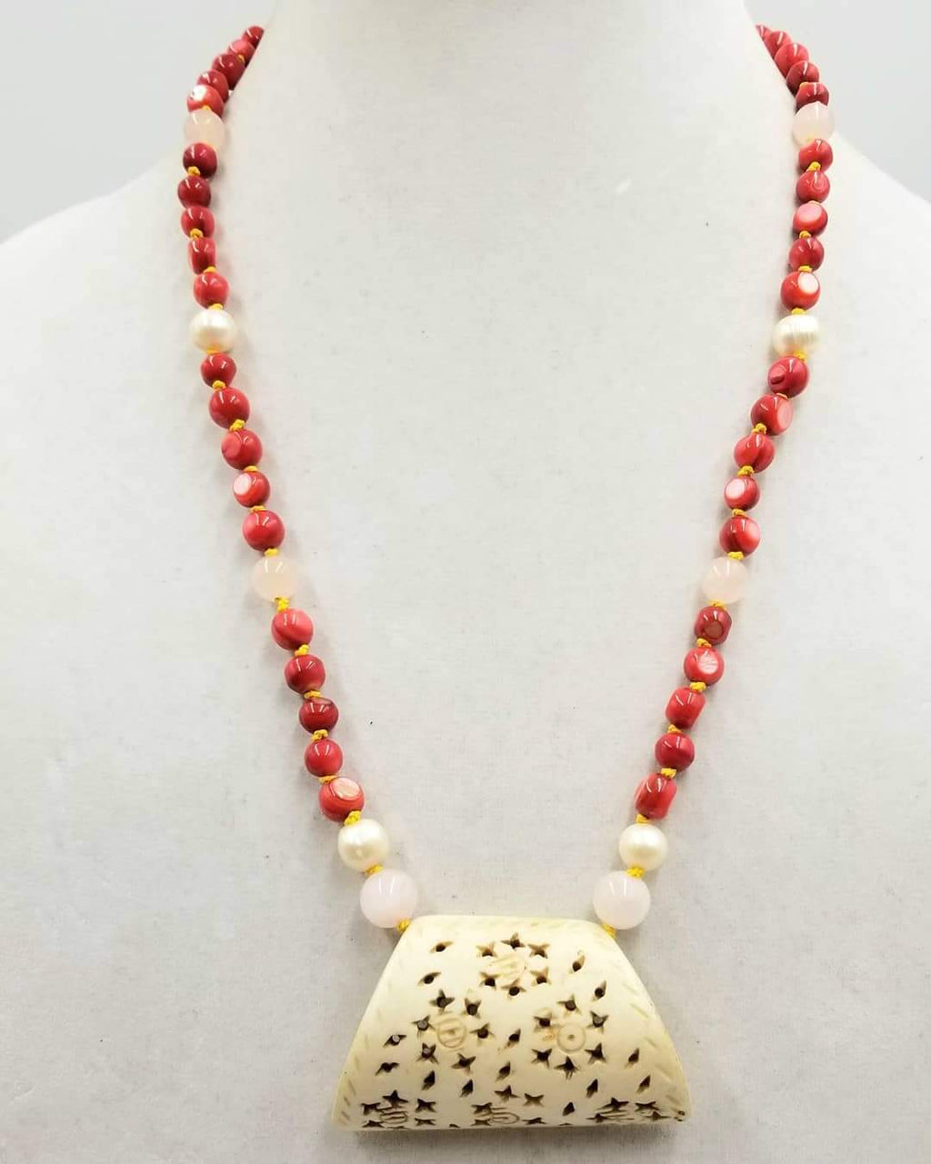 Sterling silver, dyed mother of pearl, rose quartz & white pearl, bone pendant necklace, hand-knotted with golden silk.