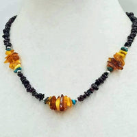 Past Work. Really special. You will get lots of compliments. Sterling silver, garnet, Baltic amber, turquoise necklace. Vegan. 18" length. Sold.