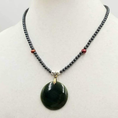 Past Work. Boldly understated, unisex, adjustable, sterling silver, hematite, & pearl necklace with vintage spinach nephrite pendant. 18