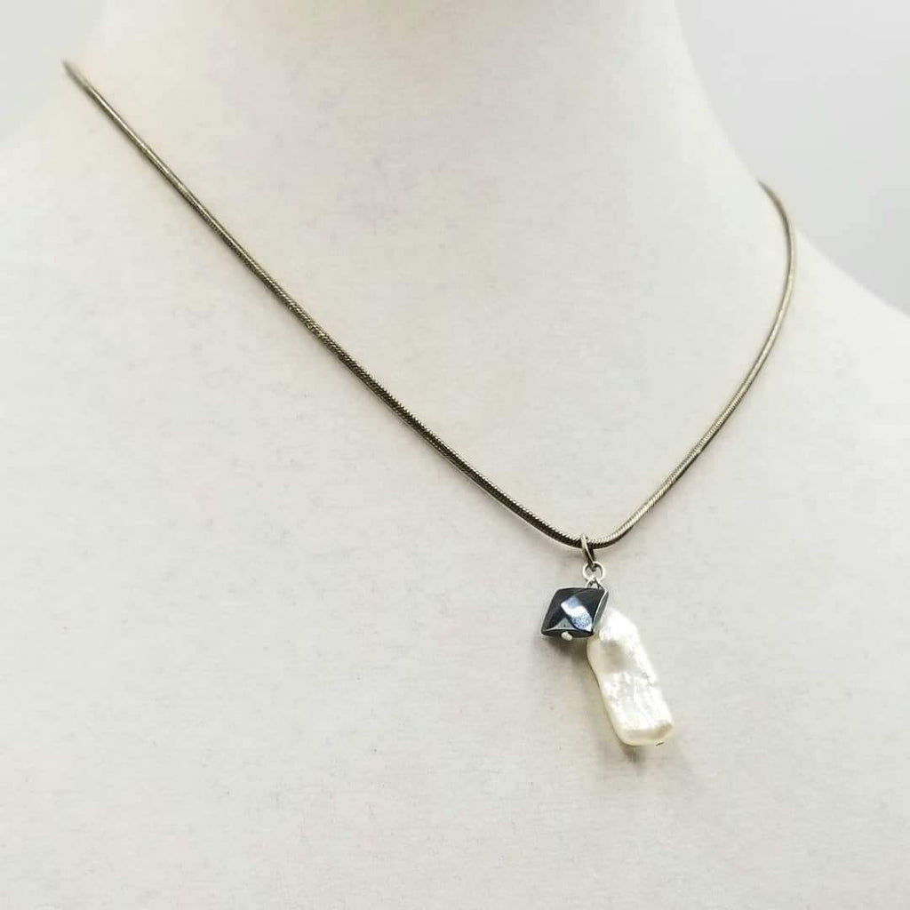 Past Work. Sterling silver, biwa pearl & hematite pendant necklace. 18" length. Sold.