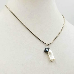 Past Work. Sterling silver, biwa pearl & hematite pendant necklace. 18" length. Sold.