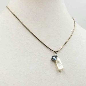 Past Work. Sterling silver, biwa pearl & hematite pendant necklace. 18" length. Sold.