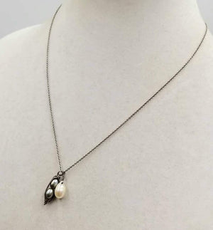 Sweet & classy. Adjustable, sterling silver & bi-tone pearls pendant necklace. 16" - 18" Length.