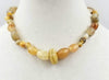Vintage yellow agate, hand-knotted on silk, necklace with aventurine charm.