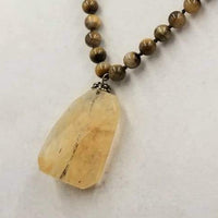 Past Work. Unisex. Sterling silver & tiger's eye necklace with art glass pendant on silk. 20" length. Sold.