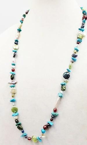 Show your colors! Multi-color pearl & turquoise & dyed magnesite rope necklace (31"). Hand-knotted on white silk.
