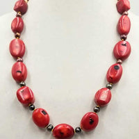 Bold, sterling silver, ombre pearl & coral necklace on hand-knotted golden silk. 29" length.