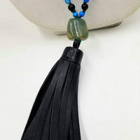 A Mala necklace of Imperial jasper, onyx, & vintage spinach nephrite, hand-knotted on verde silk, with a black leather tassel. Necklace 36" length &amp; 7" tassel.