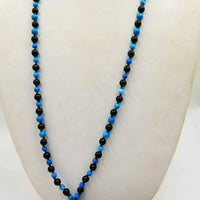 A Mala necklace of Imperial jasper, onyx, & vintage spinach nephrite, hand-knotted on verde silk, with a black leather tassel. Necklace 36" length &amp; 7" tassel.