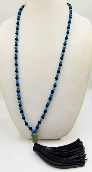 A Mala necklace of Imperial jasper, onyx, & vintage spinach nephrite, hand-knotted on verde silk, with a black leather tassel. Necklace 36" length &amp; 7" tassel.