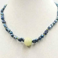 Unisex, Sterling silver, black baroque pearl & vintage carved nephrite jade focal necklace on moss green silk. 20" length.