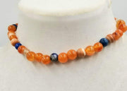 Bold choker necklace with carnelian, dyed shell, lapis lazuli, & agate. Goldfilled clasp. 13.5" length.