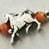 Love Horses? Sterling silver, orange aventurine, & silvertone horse charm, necklace hand-knotted with crimson silk. 19" length.