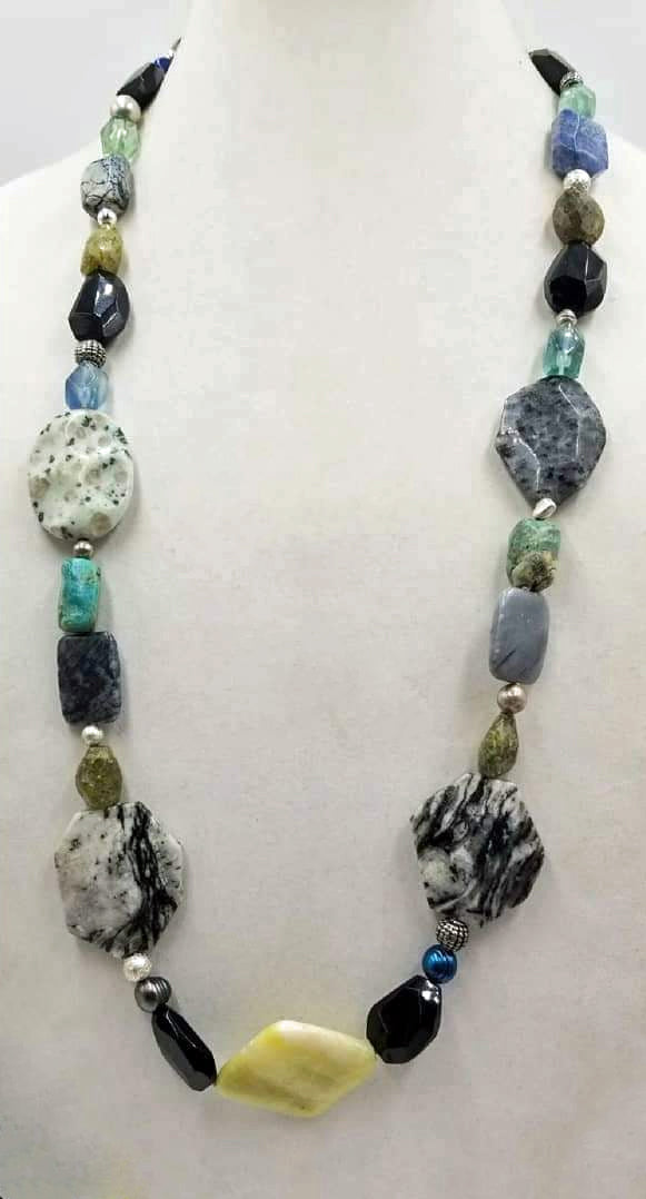 A real statement piece. A long rope of massive stones hand-knotted on pale pink silk. Sterling silver, agates, jasper and more. See the full diecription below.