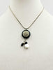 Simply beautiful. Sterling silver, onyx, & pearl pendant necklace. 16" length.
