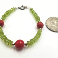 Peridot, coral, & sterling silver bracelet welcomes spring. Vegan-wear. 6.25" length.