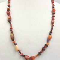 Agate, coral, tiger's eye, carnelian rope necklace, hand-knotted with periwinkle silk. 30" length.