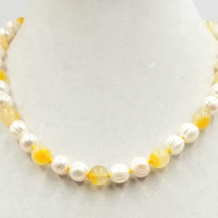 PRICE REDUCED! Classy & Unusual. 14K yellow gold, pearl, & Precious Yellow Jadeite necklace. Masterly hand-knotted with golden silk. 19" length.