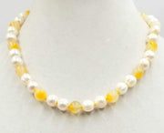Classy & Unusual. 14K yellow gold, pearl, & Precious Yellow Jadeite necklace. Masterly hand-knotted with golden silk. 19" length.