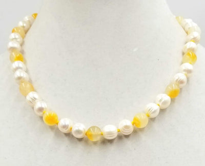 Classy & Unusual. 14K yellow gold, pearl, & Precious Yellow Jadeite necklace. Masterly hand-knotted with golden silk. 19