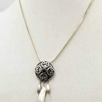 Gothic, yet sweet. Sterling silver chain & pendant necklace with pearls & garnet.  18" length.