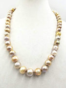 Splendid graduated massive cultured Pearl necklace with 14K yellow gold clasp. hand-knotted with dove gray silk.