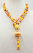 Unusual & gorgeous necklace. Precious yellow, peach, & orange jadeite, rhodonite, and dyed quartz necklace, hand-knotted with crimson silk.  39" with 4" focal.