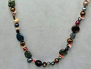 PRICE REDUCED Opera length multicolor pearl, coral, labradorite, sunstone, citrine, and chrysopraise on scarlet silk with 14KYG clasp and accents.