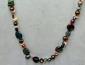 Opera length multicolor pearl, coral, labradorite, sunstone, citrine, and chrysopraise on scarlet silk with 14KYG clasp and accents.