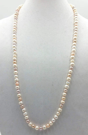 Stunning & Classic. Beige, pink, & white pearl rope necklace, crimson silk. 32" length.