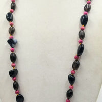 Rocking 80s Smokey quartz, magenta dyed jasper and Black onyx rope on golden silk.  39" length.