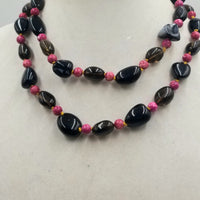 Rocking 80s Smokey quartz, magenta dyed jasper and Black onyx rope on golden silk.  39" length.