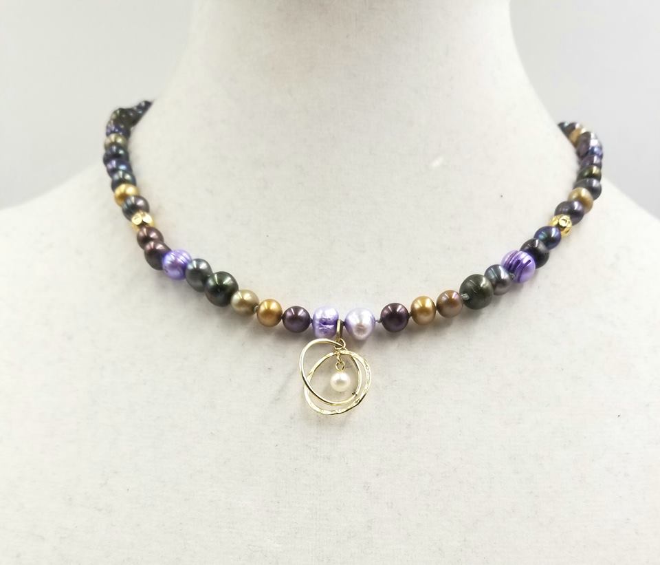 Multicolor pearl & 14KYG atomic pendant necklace on periwinkle silk.